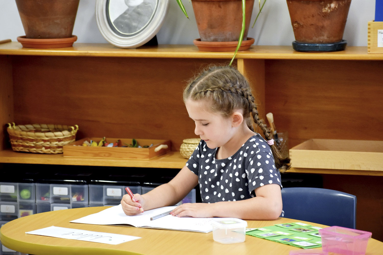 Child at work in a Montessori Classroom at Blue Gum Montessori School.